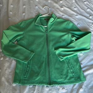 green zip up jacket